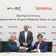 Firma del acuerdo por Haris Giatsos, consejero delegado de NMDC Infra, y Federico Ávila, presidente de Lantania, acompañados por Yasser Zaghloul, consejero delegado de NMDC Group LANTANIA