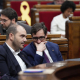 El president de la Generalitat, Savador Illa (d), y el conseller de la Presidència, Albert Dalmau (i), en una imagen de archivo en el Parlament. David Zorrakino - Europa Press