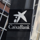 El logo de Caixabank en las Torres KIO, en Madrid (España). Jesús Hellín - Europa Press