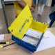 Una caja con votos por correo en un colegio electoral de Madrid  A. Pérez Meca - Europa Press