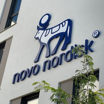 FILED - 26 September 2023, Rhineland-Palatinate, Mainz: The logo of the Danish pharmaceutical company Novo Nordisk is seen on the facade of the headquarters in Mainz. Photo: Christian Schultz/dpa Christian Schultz/dpa FILED - 26 September 2023, Rhineland-Palatinate, Mainz: The logo of the Danish pharmaceutical company Novo Nordisk is seen on the facade of the headquarters in Mainz. Photo: Christian Schultz/dpa Christian Schultz/dpa