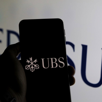 23 March 2023, Turkey, Gaziantep: The logo of the financial services company UBS is seen on the screen of a mobile in front of the logo of Credit Suisse Banks. Photo: Muhammad Ata/IMAGESLIVE via ZUMA Press Wire/dpa Muhammad Ata/Imageslive Via Zuma / Dpa