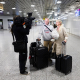 07 March 2026, Lower Saxony, Langenhagen: Tourists returning from Dubai are greeted by relatives after landing late in the evening at Hanover-Langenhagen Airport. Photo: Moritz Frankenberg/dpa Moritz Frankenberg/dpa