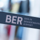 FILED - 17 July 2025, Brandenburg, Schoenefeld: A barrier tape bearing the inscription "BER Berlin Brandenburg Airport" seen at the BER Airport terminal. Photo: Christophe Gateau/dpa Christophe Gateau/dpa