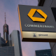 FILED - 13 February 2022, Hesse, Frankfurt_Main: The lettering and the logo of "Commerzbank" can be seen on a sign in front of the Commerzbank headquarters. Photo: Sebastian Gollnow/dpa Sebastian Gollnow/dpa