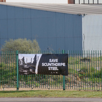 Cartel con la frase "Salvar el acero de Scunthorpe". Peter Byrne/PA Wire/dpa
