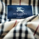 FILED - 12 March 2014, Bavaria, Bamberg: The label with the logo of the fashion designer "Burberry London" in a trench coat. Photo: David-Wolfgang Ebener/dpa David-Wolfgang Ebener/Dpa