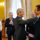 El presidente de la Xunta, Alfonso Rueda, abraza al hasta ahora conselleiro do Mar, Alfonso Villares, en el acto de posesión de la nueva conselleira ÁLVARO BALLESTEROS