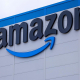 FILED - 19 September 2024, Mecklenburg-Western Pomerania, Dummerstorf: The company logo on the new logistics center of online retailer Amazon. Photo: Jens Büttner/dpa Jens Büttner/dpa