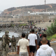 Decenas de migrantes regresan caminando a Marruecos, a 31 de julio de 2026, en Ceuta (España).  Europa Press