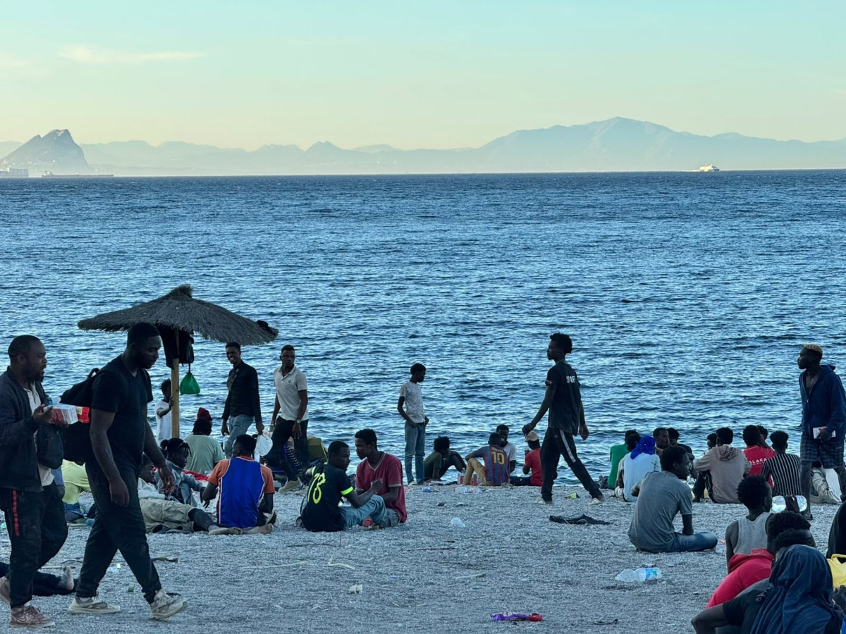 Several migrants on the Trampolín beach, on August 3, 2026, in Ceuta (Spain). Iván Zambrano / Europa Press
