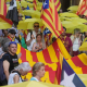 Varias personas con banderas independentistas, durante la celebración de la concentración de protesta, a 14 de julio de 2026, en Barcelona David Zorrakino - Europa Press