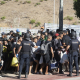 Migrantes esperan en una cola, a 24 de agosto de 2026, en Ceuta (España).  Marcos Moreno - Europa Press
