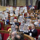 Diputados de Junts, ERC, Comuns y CUP muestran el cartel durante una sesión plenaria, en el Parlament de Catalunya, a 23 de septiembre de 2026, en Barcelona, Catalunya (España).  David Zorrakino - Europa Press