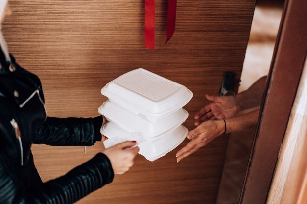 woman-handing-over-ordered-boxes-with-food-picjumbo-com woman-handing-over-ordered-boxes-with-food-picjumbo-com