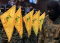 Militantes de Hezbolá con la bandera del grupoEuropa Press/Contacto/Marwan Naamani