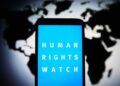 Archivo - Composición fotográfica con el logo de Human Rights Watch (HRW) sobre un mapa del mundoEuropa Press/Contacto/Pavlo Gonchar - Archivo