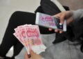 Archivo - Billetes de yuanes chinos.CHINA STRINGER NETWORK / REUT - Archivo