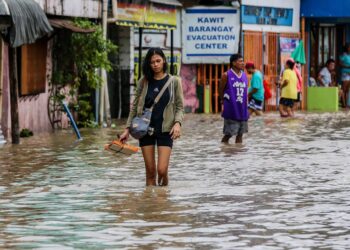 Archivo - Inundaciones por el paso de una tormenta por Filipinas.ROUELLE UMALI / XINHUA NEWS / CONTACTOPHOTO