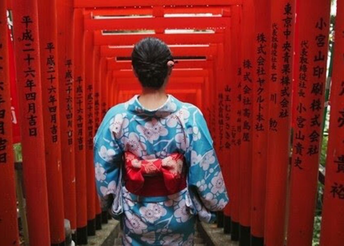 Woman, Japanese and temple or back for traditional culture for respect Tokyo travel, spirituality or history. Female person, kimono and walking staircase at shinto building, worship peace or explorePEOPLEIMAGES